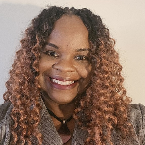 Dr. Vannetta Busch Photo showing her smiling.